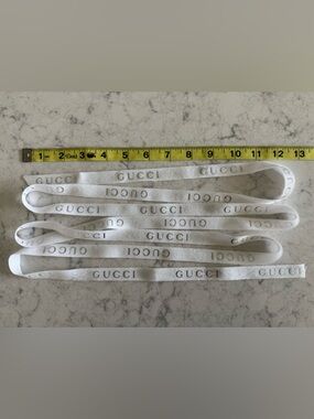 Gucci White Ribbon with Repeating Silver Logo